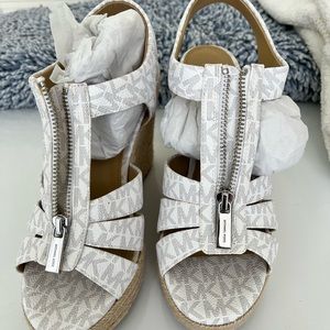 Michael Kors brand new shoes size 7. Never worn.